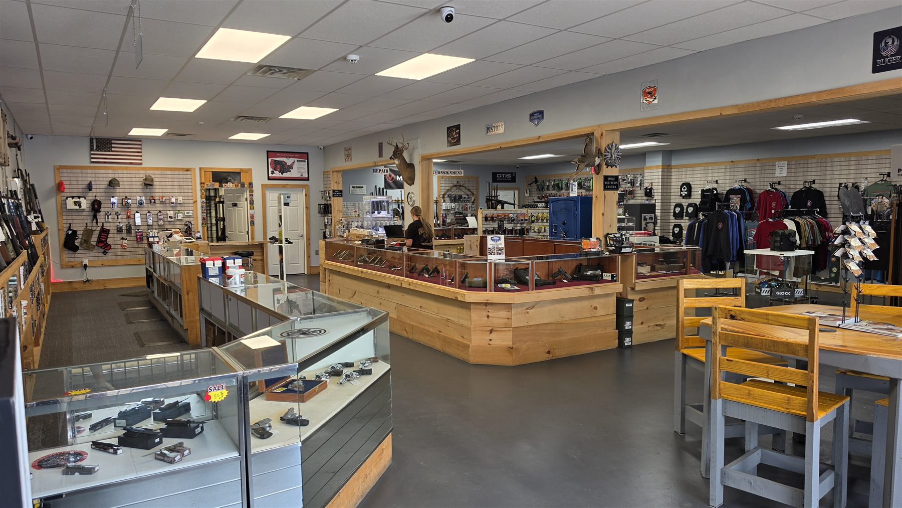Inside the Frederick store: glass cases, wood counters and the long-gun wall