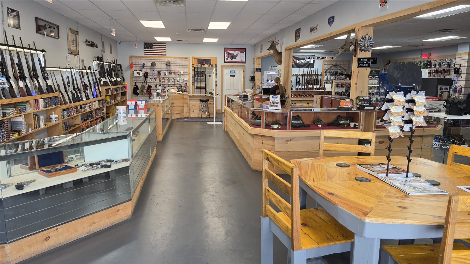 Inside the Frederick store: wood counters, glass cases and the long-gun wall